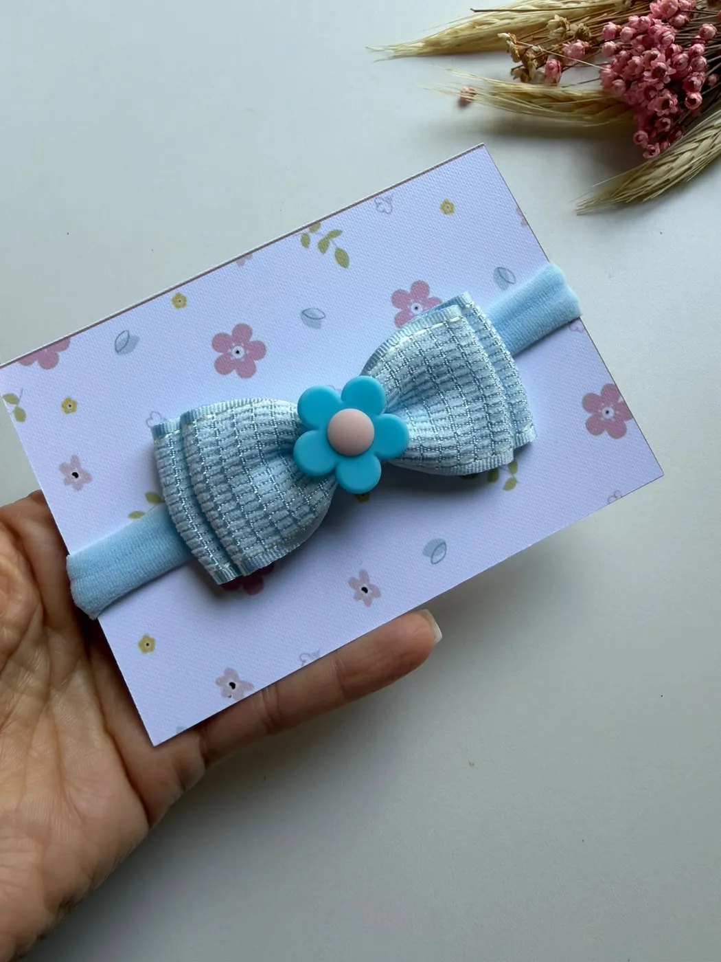 Faixinha de Bebê Laço Azul Bebê com Flor